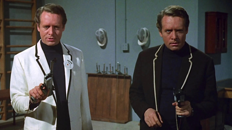 Patrick McGoohan as Number Six and his duplicate on the strange sci-fi series, The Prisoner.