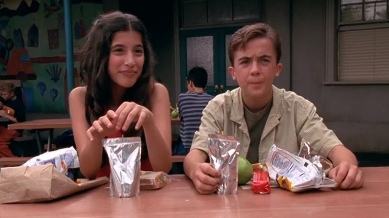 Tania Raymonde and Frankie Muniz sit for lunch in "Malcolm in the Middle."