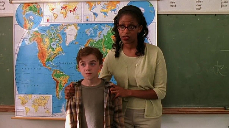 Frankie Muniz squirms in front of class alongside Merrin Dungey in "Malcolm in the Middle."
