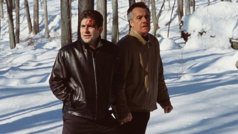Christopher (Michael Imperioli) with a bloody forehead walking through the snow with Paulie (Tony Sirico) in The Sopranos