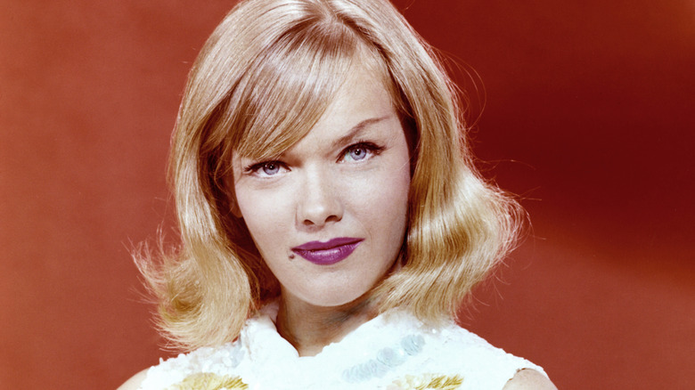Anne Francis poses for a promotional portrait for "Honey West" (1965)