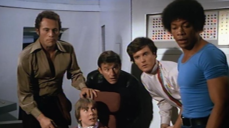 the heroes in a futuristic room in The Fantastic Journey (1977)