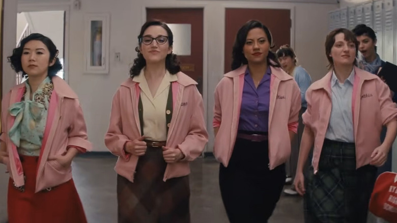 Nancy Nakagawa, Jane Facciano, Olivia Valdovinos, and Cynthia Zdunowski walk down the Rydell halls in Grease: Rise of the Pink Ladies