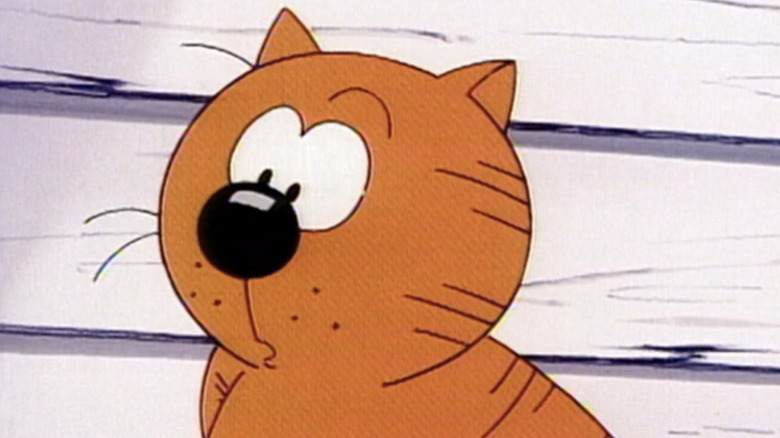 Heathcliff looking curiously at something in "Heathcliff and the Catillac Cats"