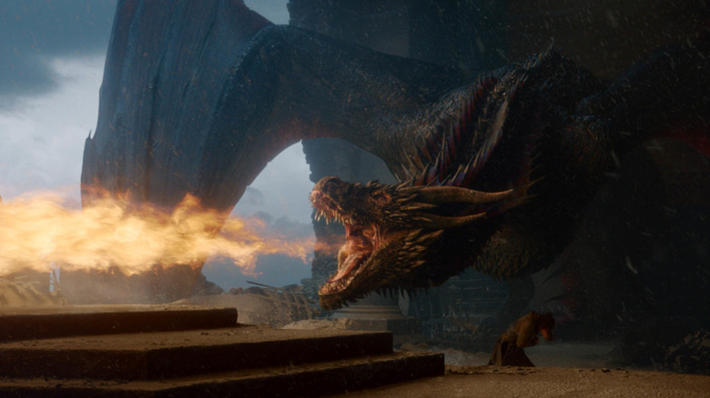 Drogon burning the Iron Throne with dragonfire at the end of Game of Thrones Season 8 (2019)