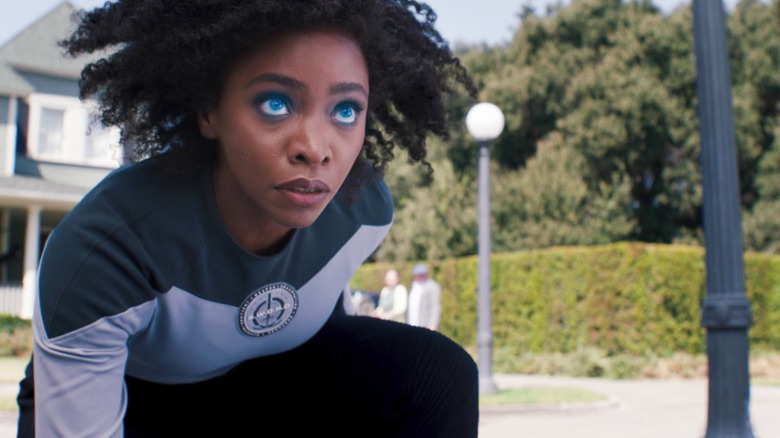 Monica Rambeau posing with her eyes glowing blue in "WandaVision"