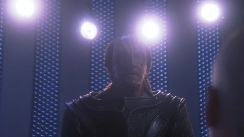 Gul Madred standing in front of four lights on Star Trek: The Next Generation