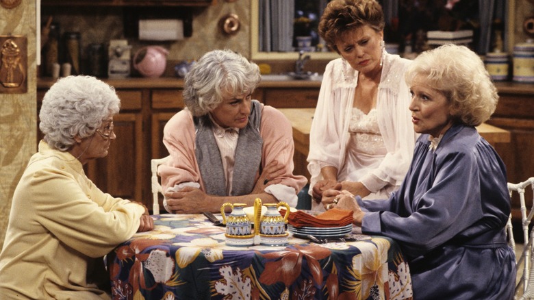 The Golden Girls, the main cast sits in the kitchen