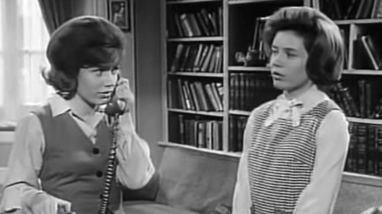 Patty Duke looking at herself while she's talking on the phone on "The Patty Duke Show"