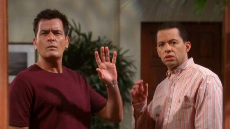 Charlie and Alan look confused on Two and a Half Men