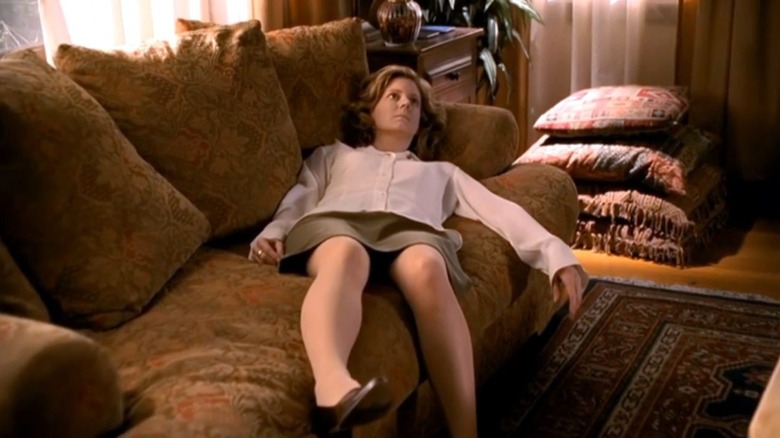 The dead body of Joyce Summers lying on a sofa in Buffy the Vampire Slayer Season 5 (2001)