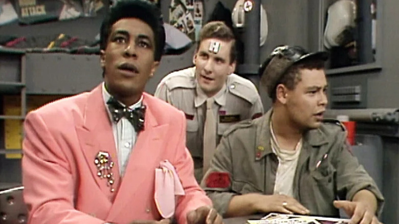 The crew of Red Dwarf look around the ship with surprise (1988)