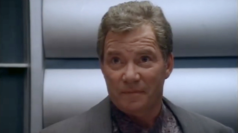 Walter Bascom looks at Jake Cardigan with his eyebrows raised in TekWar