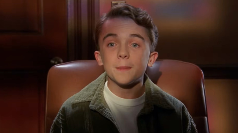 Malcolm talking to a priest in Malcolm in the Middle