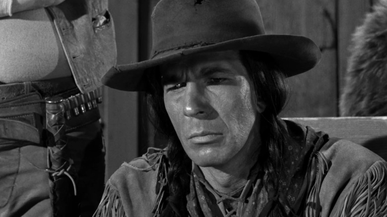 Leonard Nimoy dressed as a Native American man in "Gunsmoke" (1955)