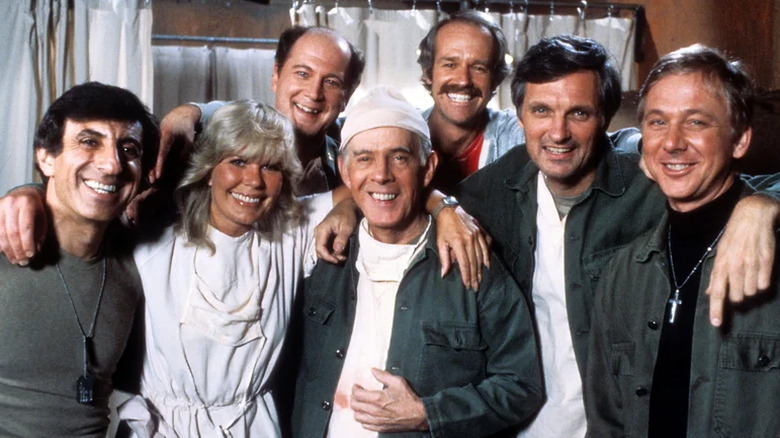 The cast of M*A*S*H smiling