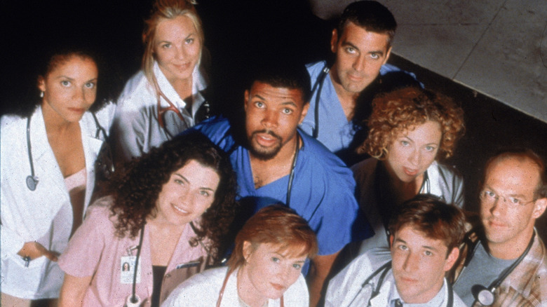 Nine "ER" cast members looking up