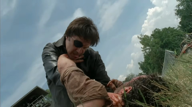 David Morrissey as The Governor, strangling Rick in The Walking Dead.