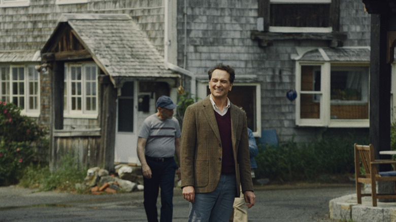 Tom Loftis smiling outside