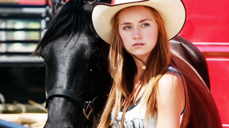 Amy Fleming with a horse in "Heartland"