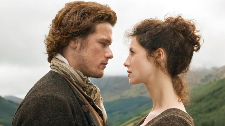Jamie and Claire looking at each other in "Outlander"