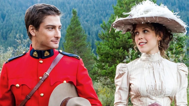 Constable Jack Thornton and Elizabeth Thatcher talking a walk in nature in "When Calls the Heart"
