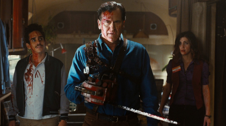 Ash wields a chainsaw inside an RV in "Ash vs Evil Dead" (2015)