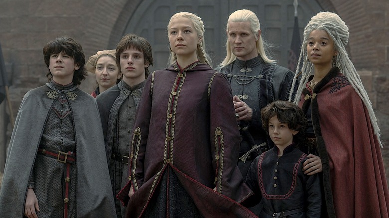 Rhaenyra Targaryen, Daemon Targaryen, and their children standing together in House of the Dragon