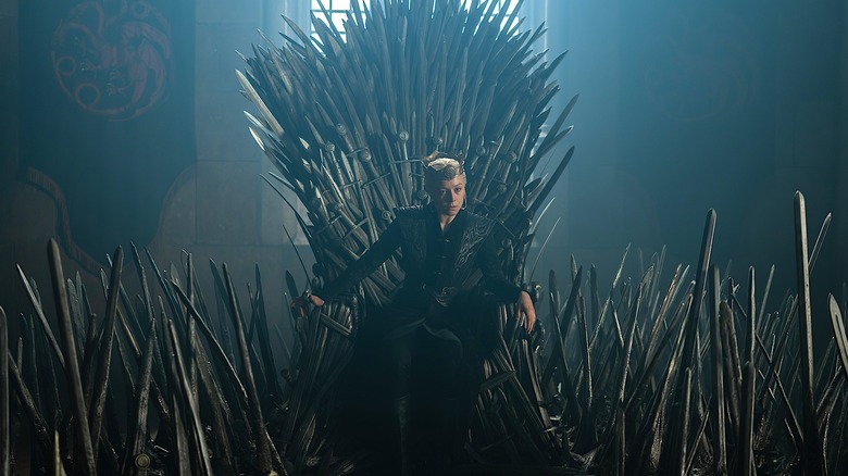 Rhaenyra Targaryen sitting on the Iron Throne in House of the Dragon