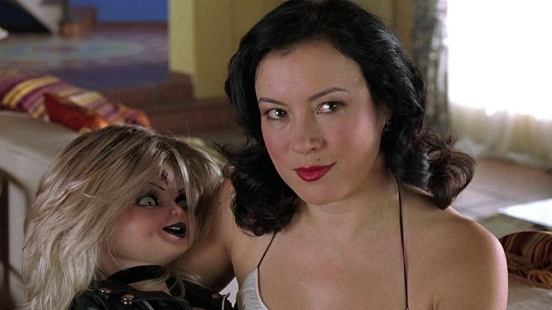 Tiffany Valentine sitting with her doll