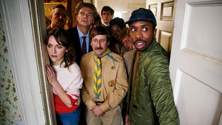 Alison and Mike with the ghosts in the British version of "Ghosts"