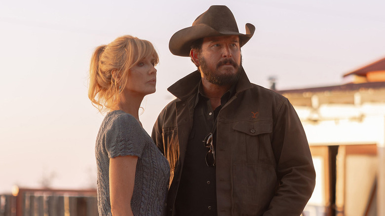 Beth (Kelly Reilly) standing next to Rip (Cole Hauser) on "Dutton Ranch."