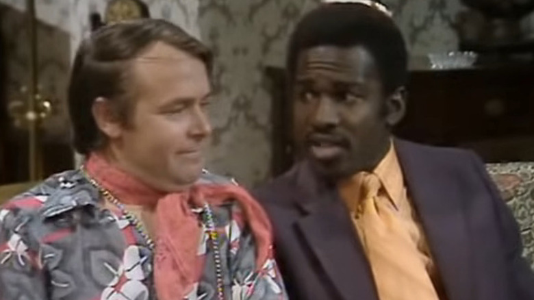Eddie in women's top and Bill in suit in "Love Thy Neighbour" (1972-1976)