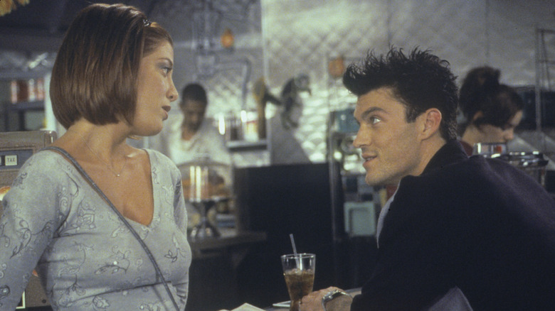 Tori Spelling's Donna Martin talking with Brian Austin Green's David Silver on Beverly Hills, 90210