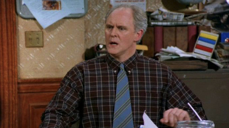 John Lithgow as Dick Solomon looks shocked in 3rd Rock From the Sun