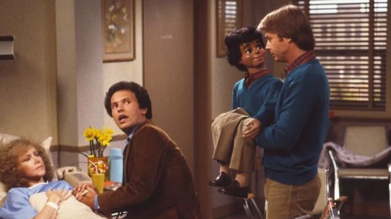 Chuck and Bob Campbell talking to Jodie Dallas in Mary's hospital room