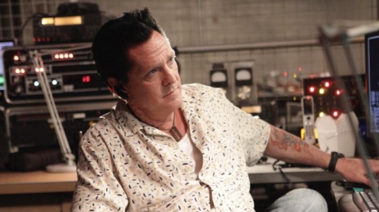 Michael Madsen's Jim Ricker sitting at a computer desk on "24"