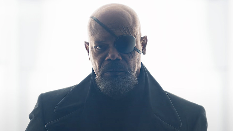 Nick Fury stands against a white background in Secret Invasion (2023)