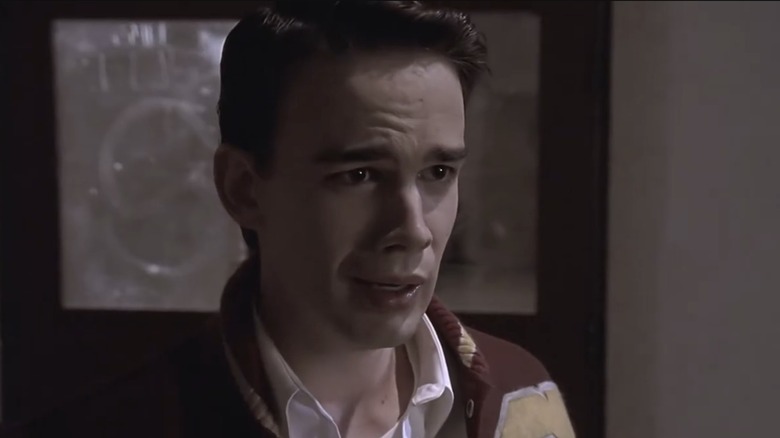 Christopher Gorham as James Stanley wearing a red and yellow varsity jacket as with an upset expression in "Buffy the Vampire Slayer."