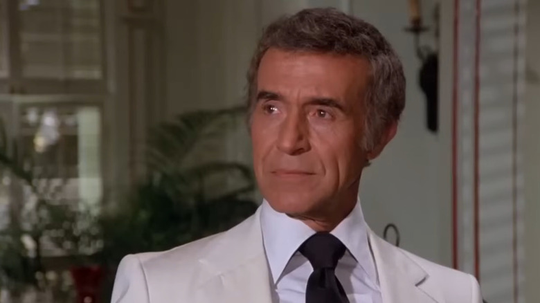 Mr. Roarke looking on to the side