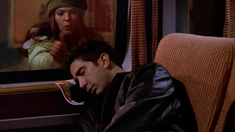 David Schwimmer as Ross, asleep on the train on Friends.