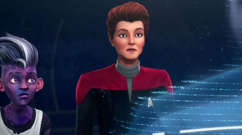 Dal and Janeway talk to a hologram on Star Trek: Prodigy