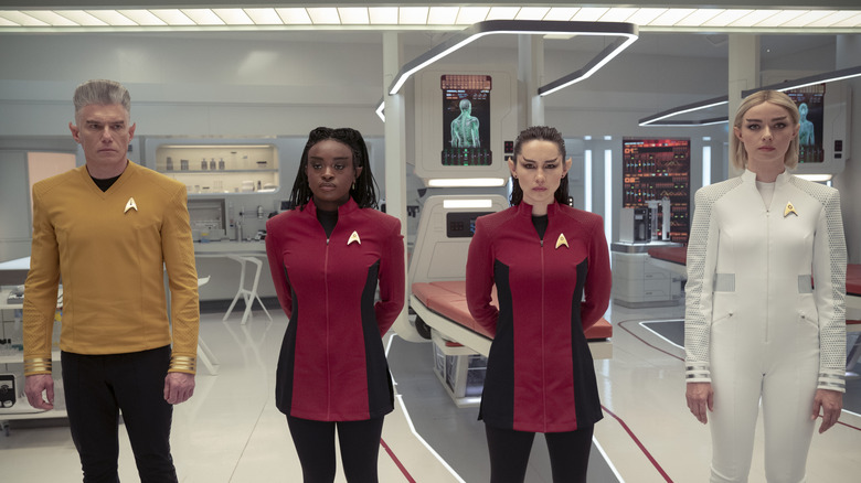 Anson Mount as Pike, Celia Rose Gooding as Uhura, Christina Ching as La'An, and Jess Bush as Chapel, after they've all become part-Vulcan on Star Trek: Strange New Worlds
