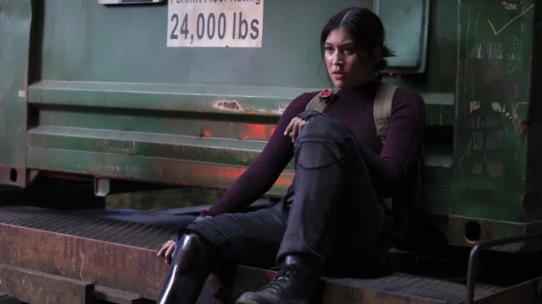 Alaqua Cox's Maya "Echo" Lopez sitting and wearing tactical gear on Echo
