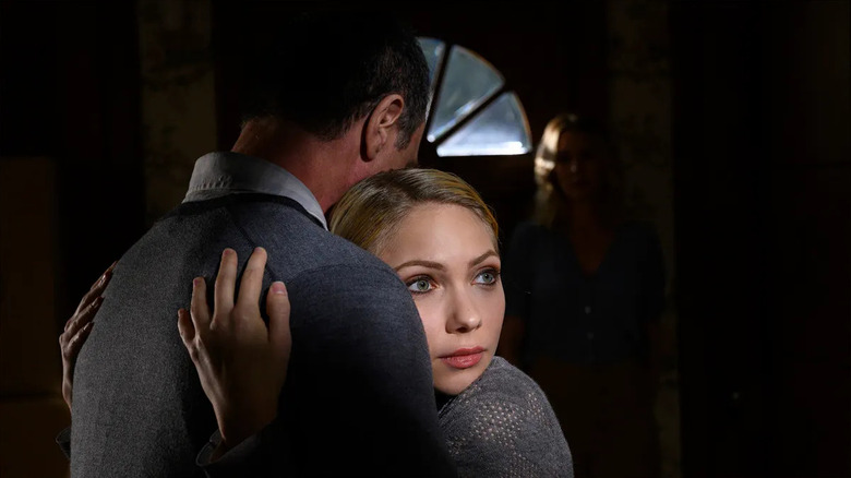 Robert (Chris Meloni) hugs Maggie (Tavi Gevinson) in The Twilight Zone