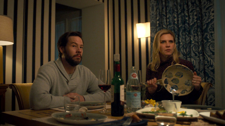 Mike (Ike Barinholtz) and Martha (Rhea Seehorn) sit at a dinner table in The Twilight Zone