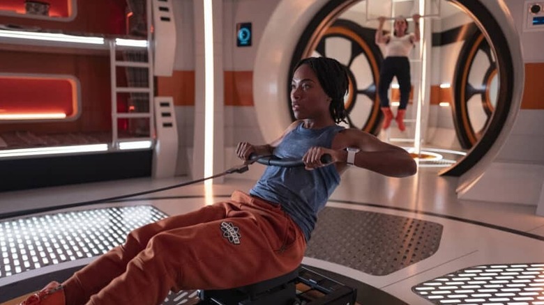 Alexa Brandt (DeWanda Wise) exercises on a rowing machine in The Twilight Zone