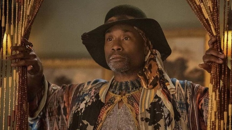 Keith (Billy Porter) parts a beaded curtain in The Twilight Zone