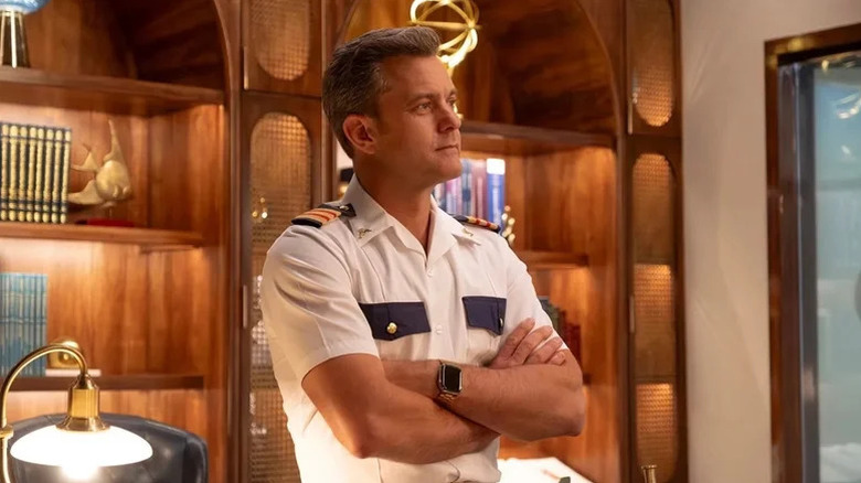 Joshua Jackson's Dr. Max Bankman folding his arms in an office on Doctor Odyssey