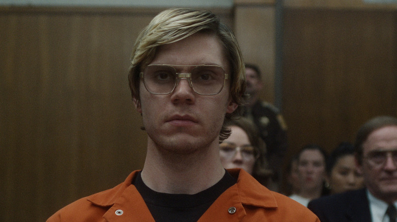 Evan Peters' Jeffrey Dahmer wearing prisoner's clothes in Dahmer - Monster: The Jeffrey Dahmer Story
